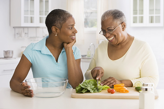 Image of a young and old women in kitchen