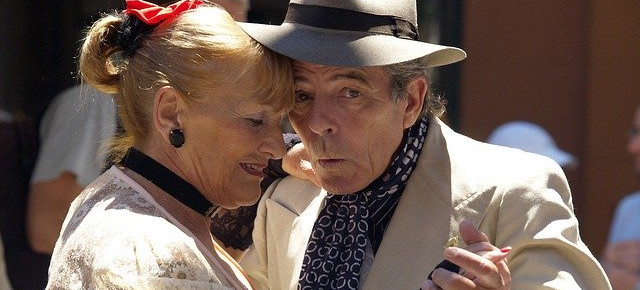 a man and woman dancing