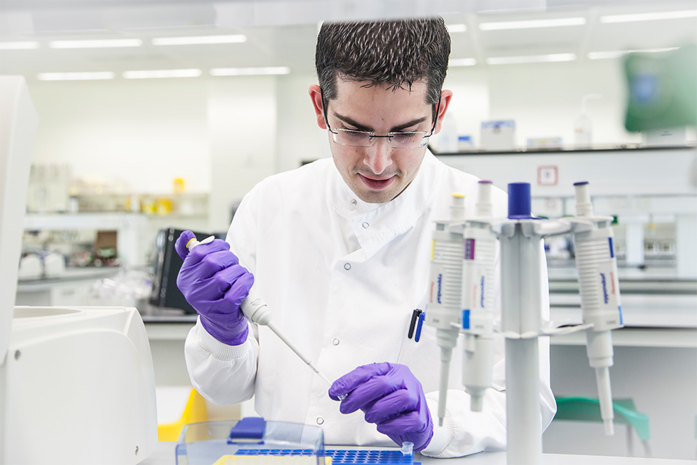 Paul Baker working in the School of Biological Sciences laboratory