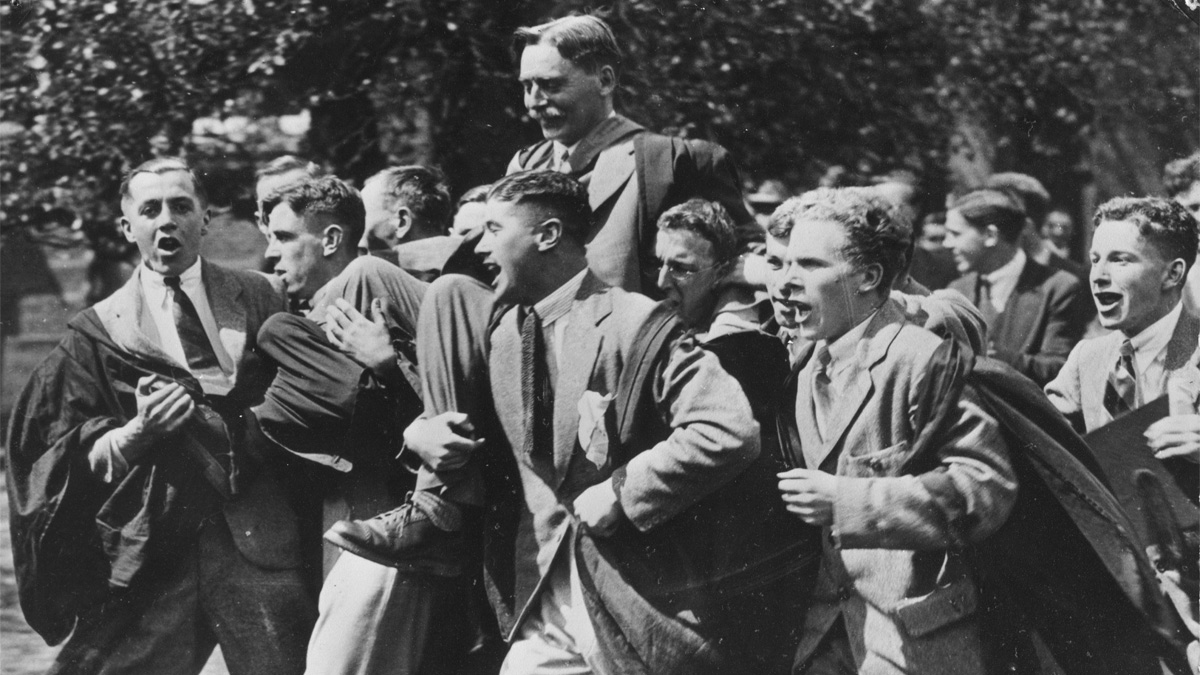 Dr WM Childs, the University’s first Vice-Chancellor being carried by students through the grounds in celebration