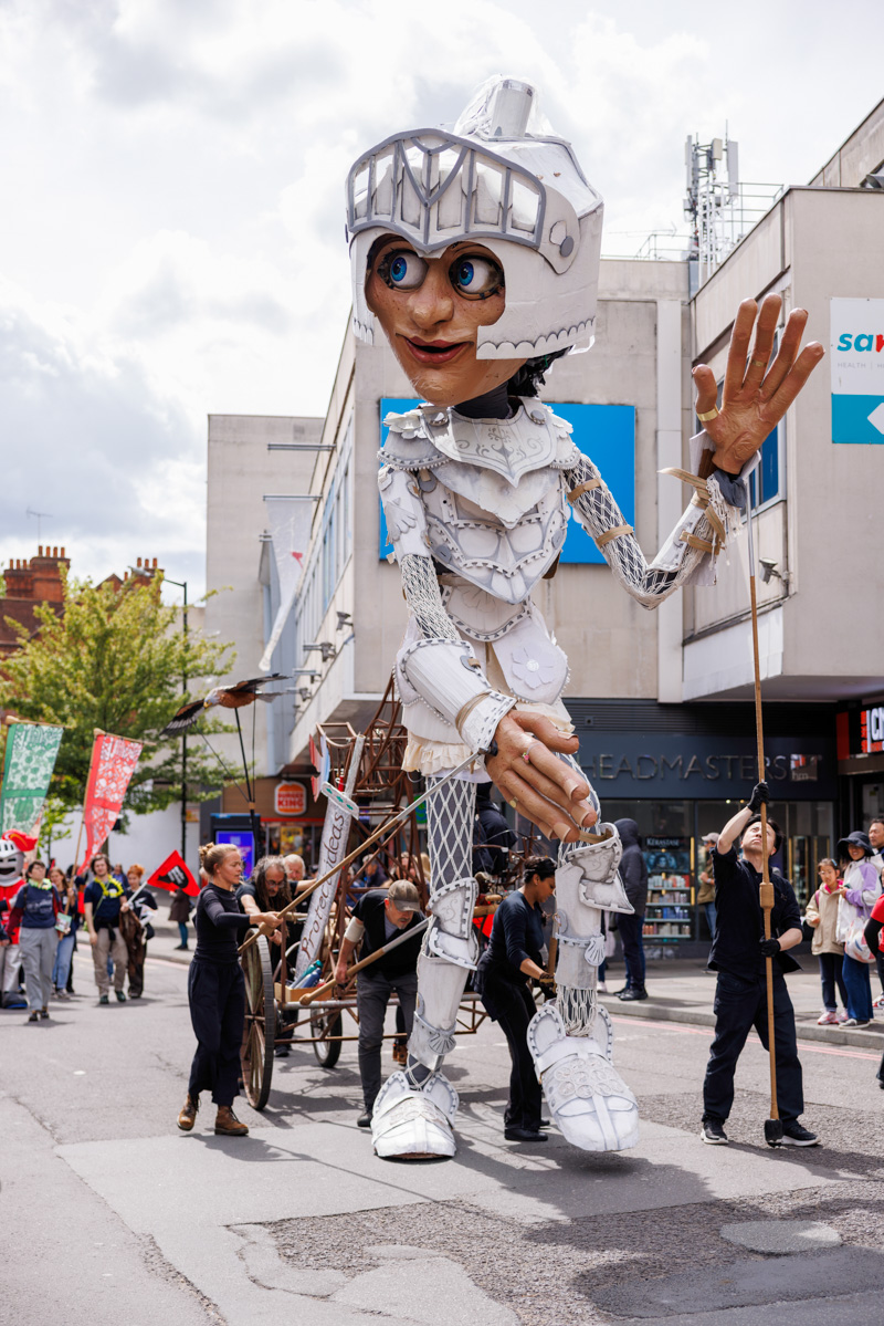 Parade of people through town centre