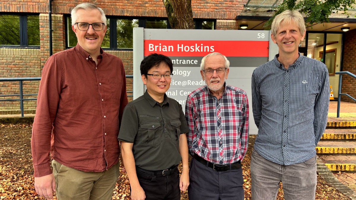Group photo showing, from left to right, Prof. Andrew Charlton-Perez OBE, Dr. Fumiaki Ogawa, Prof. Sir Brian Hoskins CBE FRS, and Prof. John Methven, posing in front of the camera outside the Brian Hoskins building at the University of Reading's Whiteknights Campus.