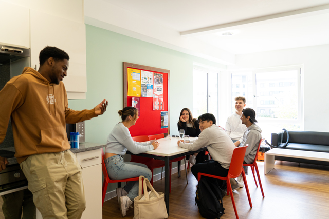 Students talking in a communal space