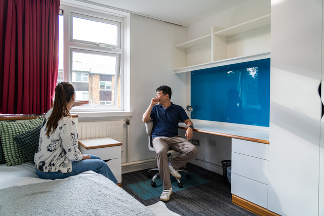 Two students in bedroom