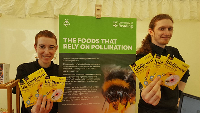 Students holding seed packets